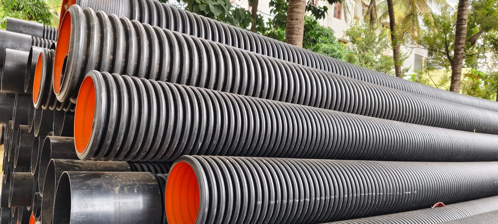 Mangarish, DWC HDPE pipes in bangalore, Corrugated HDPE Pipes in bangalore, Corrugated Double Walled pipes in bangalore, DWC Pipes in bangalore, HDPE pipes in bangalore, Drainage pipes in bangalore, Sewerage pipes in bangalore, Conduit pipes, Sub surface drainage pipes, PT Ducts in bangalore, Corrugated Single Walled Pipes in bangalore, Storm water pipes in bangalore, Clear water logging pipes in bangalore, Post Tensioning Sheathing Ducts in bangalore, Corrugated Sheathing Ducts in bangalore, Plastic Moulded Cable Channel in bangalore, DWC-HDPE Pipes in bangalore, S-DWC-HDPE Pipes in bangalore, DWC-HDPE, CPF pipes in bangalore, CHS ducts in bangalore, PC Channel for laying cables in bangalore, P-HDPE pipes in bangalore